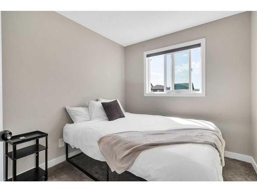 173 Belmont Drive Sw, Calgary, AB - Indoor Photo Showing Bedroom