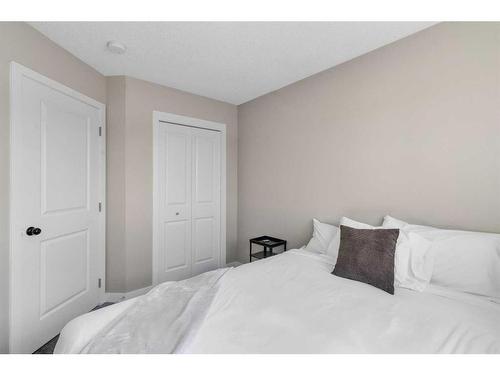 173 Belmont Drive Sw, Calgary, AB - Indoor Photo Showing Bedroom