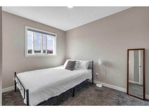 173 Belmont Drive Sw, Calgary, AB - Indoor Photo Showing Bedroom