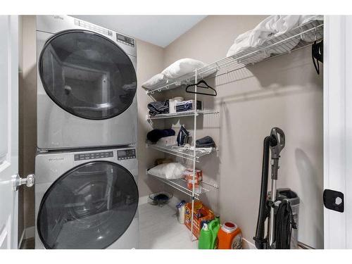 173 Belmont Drive Sw, Calgary, AB - Indoor Photo Showing Laundry Room