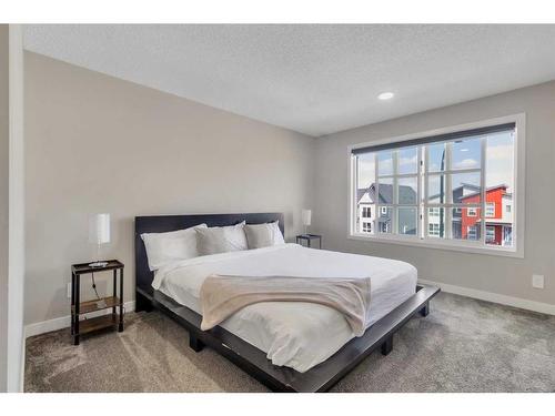 173 Belmont Drive Sw, Calgary, AB - Indoor Photo Showing Bedroom