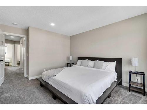 173 Belmont Drive Sw, Calgary, AB - Indoor Photo Showing Bedroom