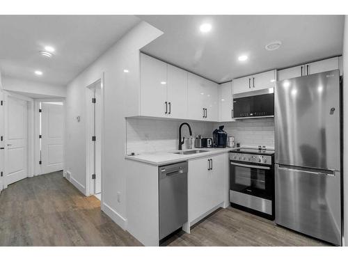 173 Belmont Drive Sw, Calgary, AB - Indoor Photo Showing Kitchen With Stainless Steel Kitchen