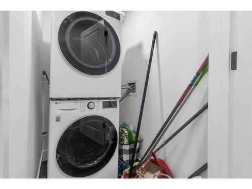 173 Belmont Drive Sw, Calgary, AB - Indoor Photo Showing Laundry Room