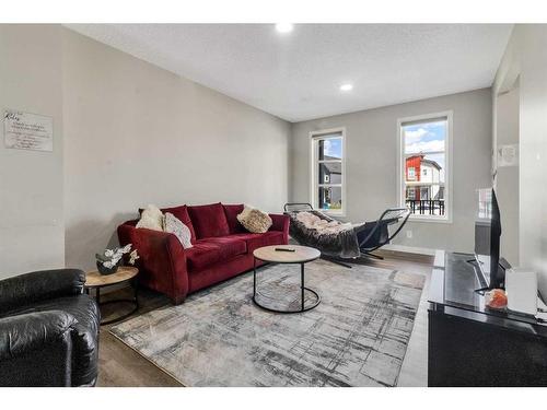 173 Belmont Drive Sw, Calgary, AB - Indoor Photo Showing Living Room