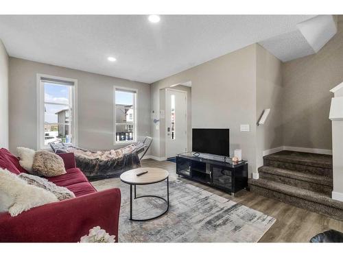 173 Belmont Drive Sw, Calgary, AB - Indoor Photo Showing Living Room