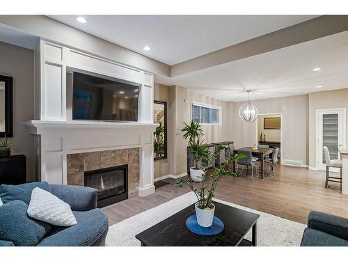 182 Mahogany Passage Se, Calgary, AB - Indoor Photo Showing Living Room With Fireplace