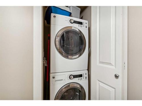 804-1088 6 Avenue Sw, Calgary, AB - Indoor Photo Showing Laundry Room