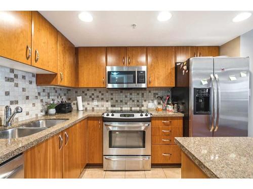 804-1088 6 Avenue Sw, Calgary, AB - Indoor Photo Showing Kitchen With Stainless Steel Kitchen With Double Sink