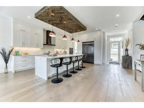 213 12A Street Ne, Calgary, AB - Indoor Photo Showing Kitchen With Upgraded Kitchen