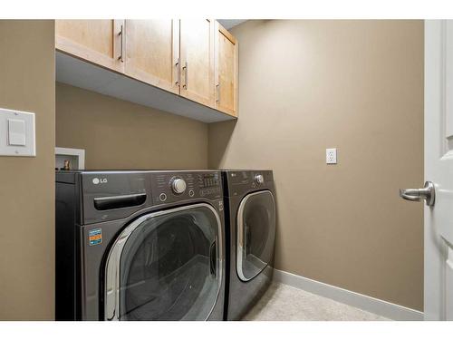 1118 Wentworth View Sw, Calgary, AB - Indoor Photo Showing Laundry Room