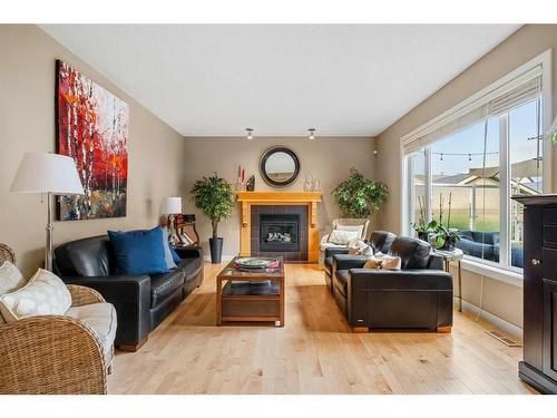 1118 Wentworth View Sw, Calgary, AB - Indoor Photo Showing Living Room With Fireplace