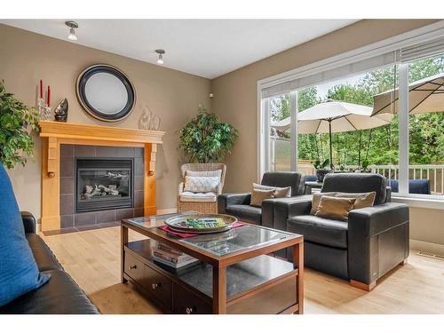 1118 Wentworth View Sw, Calgary, AB - Indoor Photo Showing Living Room With Fireplace