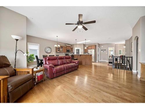 564 Harrison Court, Crossfield, AB - Indoor Photo Showing Living Room