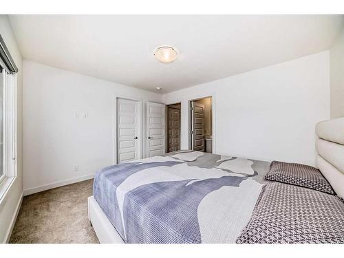 119 Belvedere Avenue Se, Calgary, AB - Indoor Photo Showing Bedroom