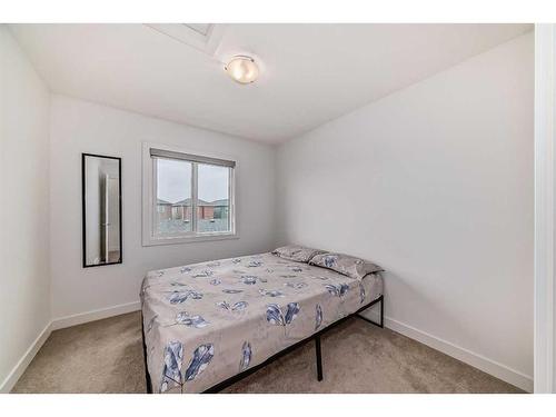 119 Belvedere Avenue Se, Calgary, AB - Indoor Photo Showing Bedroom