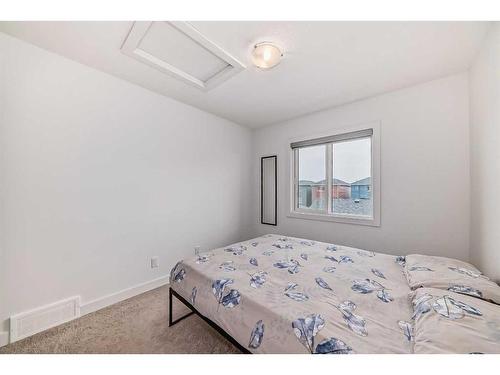 119 Belvedere Avenue Se, Calgary, AB - Indoor Photo Showing Bedroom