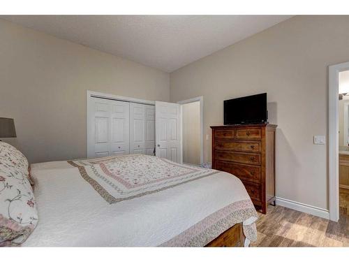 344 Willow Ride Manor, Diamond Valley, AB - Indoor Photo Showing Bedroom