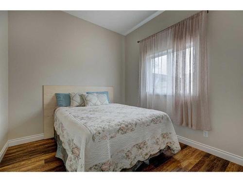 344 Willow Ridge Manor, Diamond Valley, AB - Indoor Photo Showing Bedroom