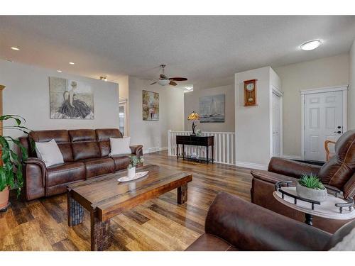 344 Willow Ridge Manor, Diamond Valley, AB - Indoor Photo Showing Living Room