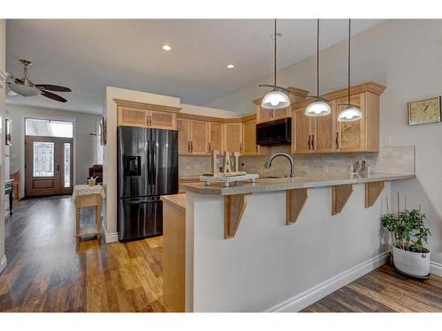 344 Willow Ride Manor, Diamond Valley, AB - Indoor Photo Showing Kitchen With Upgraded Kitchen