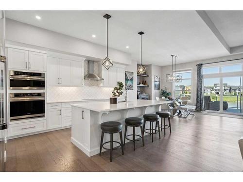 1207 Bayside Drive Sw, Airdrie, AB - Indoor Photo Showing Kitchen With Upgraded Kitchen