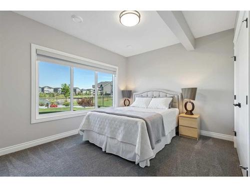 1207 Bayside Drive Sw, Airdrie, AB - Indoor Photo Showing Bedroom