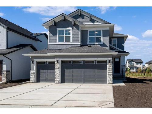 226 Kinniburgh Loop, Chestermere, AB - Outdoor With Facade