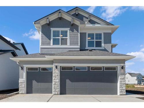 226 Kinniburgh Loop, Chestermere, AB - Outdoor With Facade