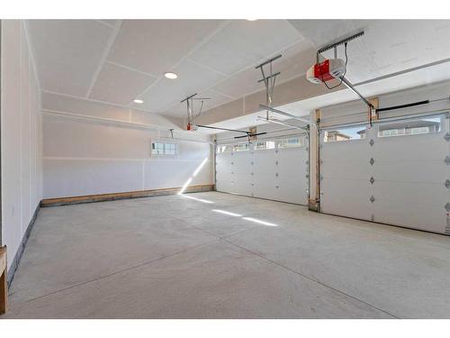 226 Kinniburgh Loop, Chestermere, AB - Indoor Photo Showing Garage