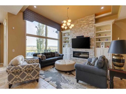 188 Valley Creek Road Nw, Calgary, AB - Indoor Photo Showing Living Room With Fireplace