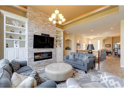 188 Valley Creek Road Nw, Calgary, AB - Indoor Photo Showing Living Room With Fireplace