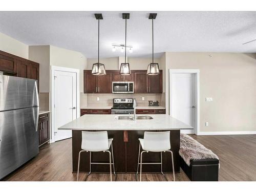 416-10 Walgrove Walk Se, Calgary, AB - Indoor Photo Showing Kitchen With Double Sink With Upgraded Kitchen