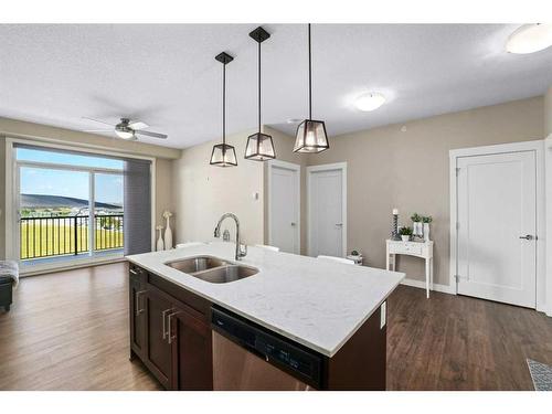 416-10 Walgrove Walk Se, Calgary, AB - Indoor Photo Showing Kitchen With Double Sink With Upgraded Kitchen