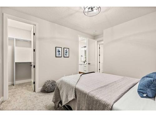 210 Blackstone Road, Balzac, AB - Indoor Photo Showing Bedroom