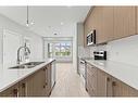 2207-60 Skyview Ranch Road Ne, Calgary, AB  - Indoor Photo Showing Kitchen With Double Sink With Upgraded Kitchen 