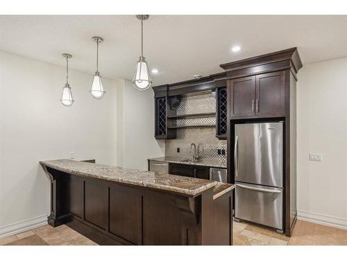 137 Aspen Summit Heath Sw, Calgary, AB - Indoor Photo Showing Kitchen With Upgraded Kitchen