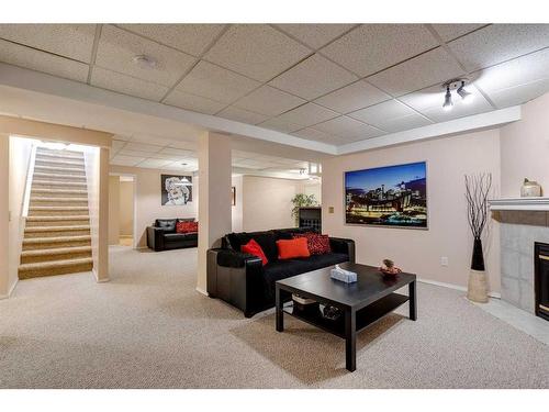 199 Somerglen Road Sw, Calgary, AB - Indoor With Fireplace