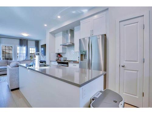 116-81 Greenbriar Place Nw, Calgary, AB - Indoor Photo Showing Kitchen With Double Sink