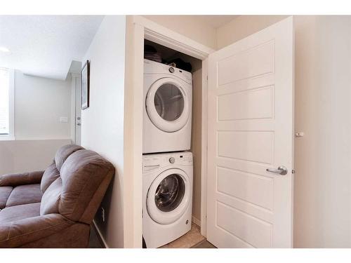 19464 37 Street Se, Calgary, AB - Indoor Photo Showing Laundry Room