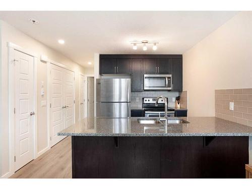 19464 37 Street Se, Calgary, AB - Indoor Photo Showing Kitchen With Stainless Steel Kitchen With Upgraded Kitchen