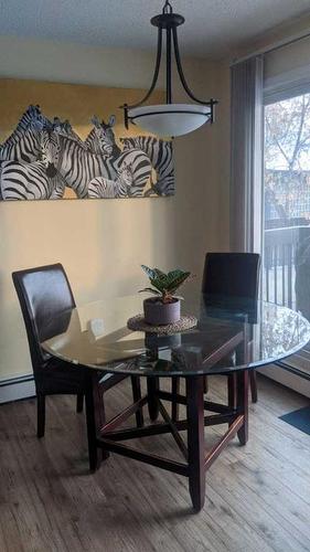 105-205 5 Avenue Ne, Calgary, AB - Indoor Photo Showing Dining Room