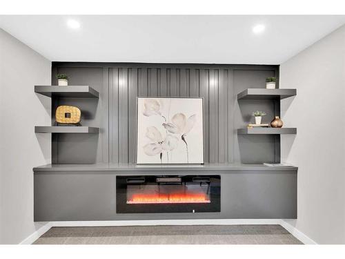 7708 Silver Springs Road Nw, Calgary, AB - Indoor Photo Showing Other Room With Fireplace