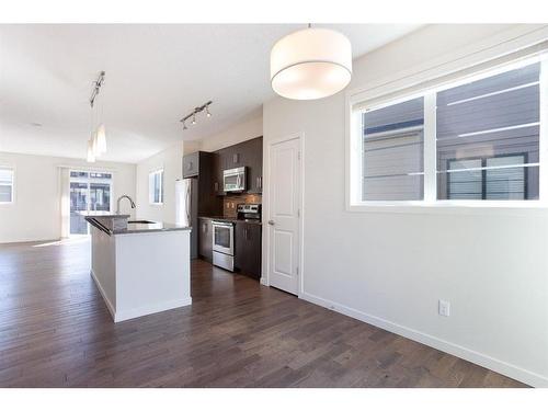 16 Walden Walk Se, Calgary, AB - Indoor Photo Showing Kitchen