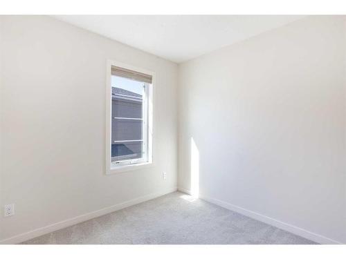 16 Walden Walk Se, Calgary, AB - Indoor Photo Showing Other Room