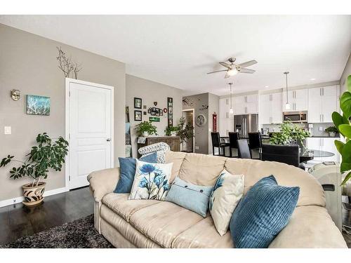 204-881 Sage Valley Boulevard Nw, Calgary, AB - Indoor Photo Showing Living Room