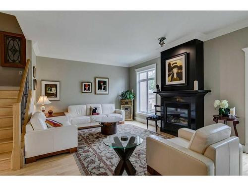 2306 24 Avenue Sw, Calgary, AB - Indoor Photo Showing Living Room With Fireplace