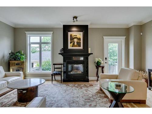 2306 24 Avenue Sw, Calgary, AB - Indoor Photo Showing Living Room With Fireplace