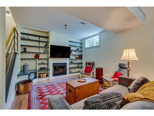 2306 24 Avenue Sw, Calgary, AB - Indoor Photo Showing Living Room With Fireplace