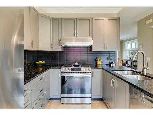 2306 24 Avenue Sw, Calgary, AB - Indoor Photo Showing Kitchen With Double Sink With Upgraded Kitchen